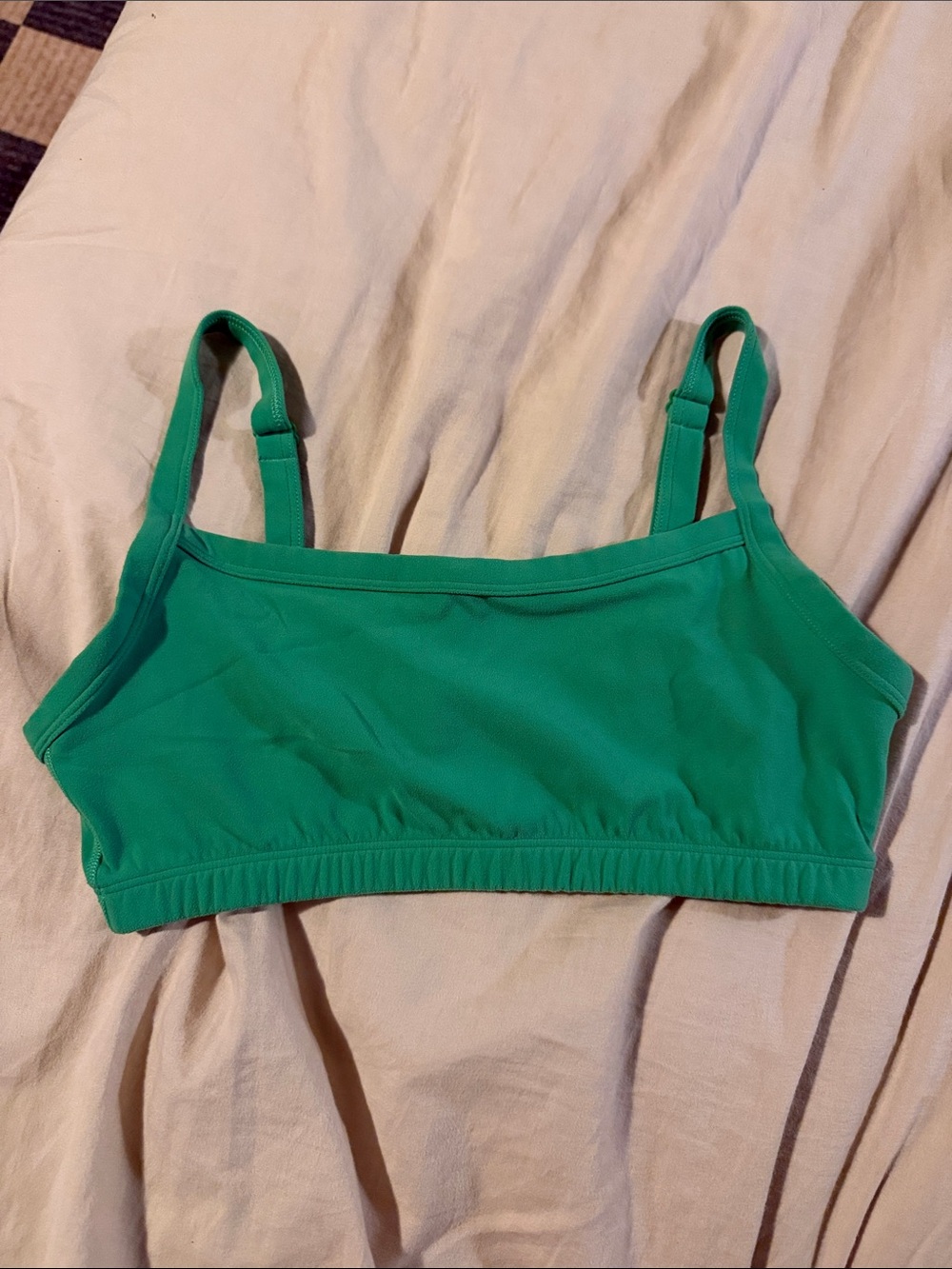 Aritzia TNA Butter Tumbler Sports Bra in Court Green
